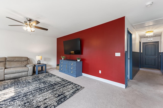 737 Heartwood Dr, Leland, NC 28479 - carpeted living area featuring attic access, ceiling fan, and baseboards
