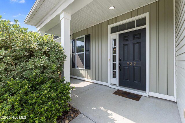 737 Heartwood Dr, Leland, NC 28479 - doorway to property featuring a porch