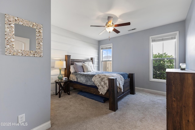737 Heartwood Dr, Leland, NC 28479 - carpeted bedroom with baseboards and ceiling fan