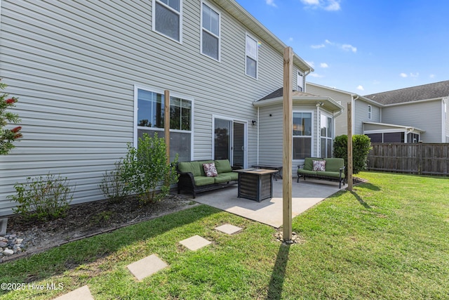 737 Heartwood Dr, Leland, NC 28479 - rear view of property featuring an outdoor living space and a patio area