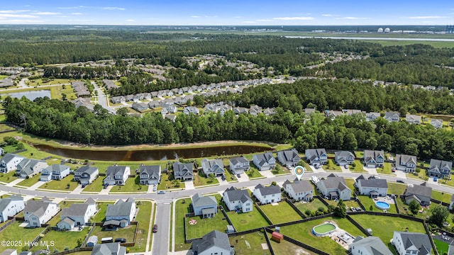 737 Heartwood Dr, Leland, NC 28479 - view of property location featuring a heavily wooded area and nearby suburban area