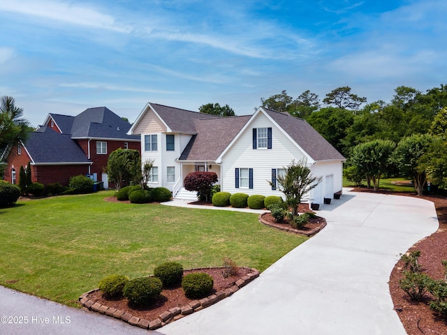142 Magens Way, Cedar Point, NC 28584 - traditional home featuring concrete driveway, a front lawn, and roof with shingles