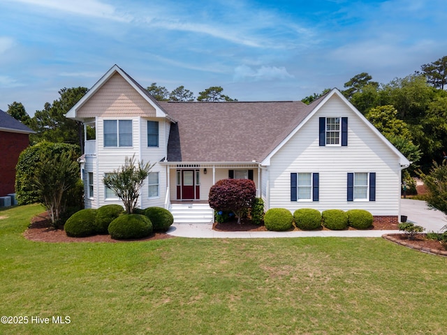 142 Magens Way, Cedar Point, NC 28584 - view of front facade with a front lawn, a shingled roof, and a porch