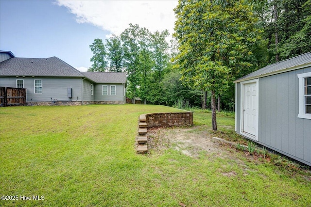 409 Kinnakeet Ln, New Bern, NC 28562 - view of green lawn featuring an outbuilding