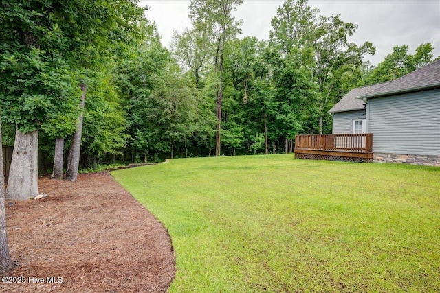 409 Kinnakeet Ln, New Bern, NC 28562 - view of green lawn with a wooden deck
