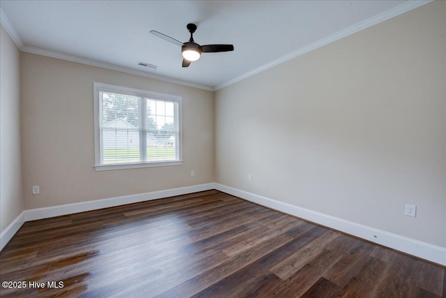 409 Kinnakeet Ln, New Bern, NC 28562 - spare room with dark wood-type flooring, baseboards, a ceiling fan, and ornamental molding