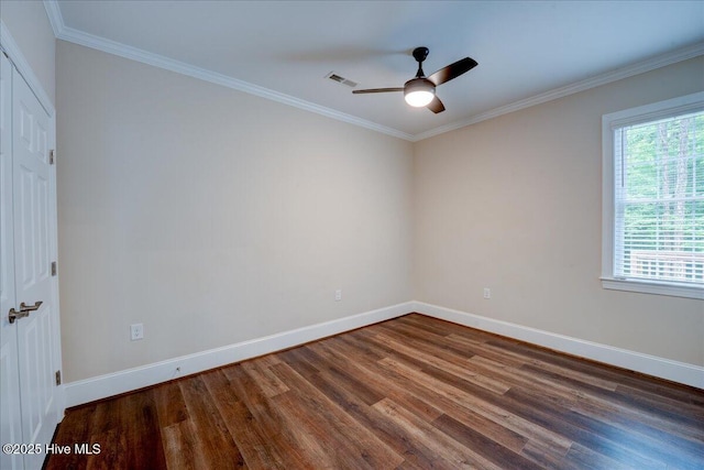 409 Kinnakeet Ln, New Bern, NC 28562 - empty room with wood finished floors, baseboards, a ceiling fan, and ornamental molding