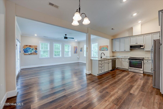 409 Kinnakeet Ln, New Bern, NC 28562 - kitchen featuring stainless steel appliances, a sink, a chandelier, range hood, and baseboards
