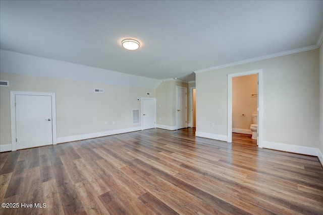 409 Kinnakeet Ln, New Bern, NC 28562 - unfurnished living room with ornamental molding, wood finished floors, and baseboards