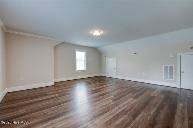 409 Kinnakeet Ln, New Bern, NC 28562 - bonus room with dark wood-type flooring, baseboards, and lofted ceiling