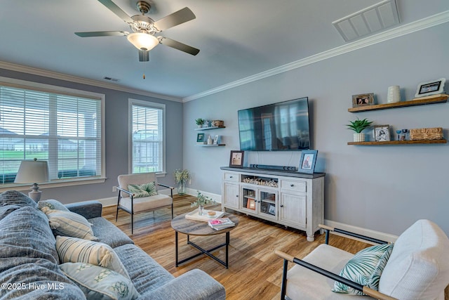 1279 Pandion Dr, Wilmington, NC 28411 - living room with crown molding, light wood finished floors, a ceiling fan, and baseboards