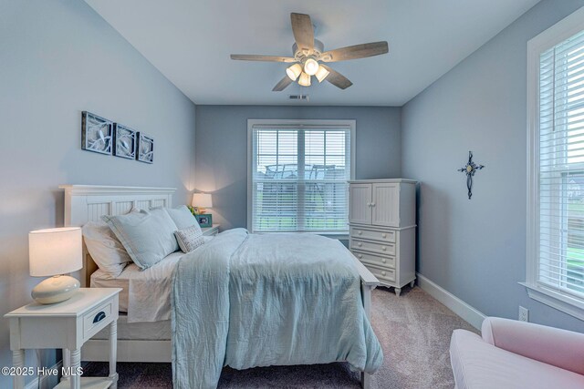1279 Pandion Dr, Wilmington, NC 28411 - bedroom featuring carpet flooring, multiple windows, baseboards, and ceiling fan