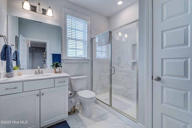 1279 Pandion Dr, Wilmington, NC 28411 - bathroom featuring marble look tile flooring, toilet, vanity, a stall shower, and recessed lighting