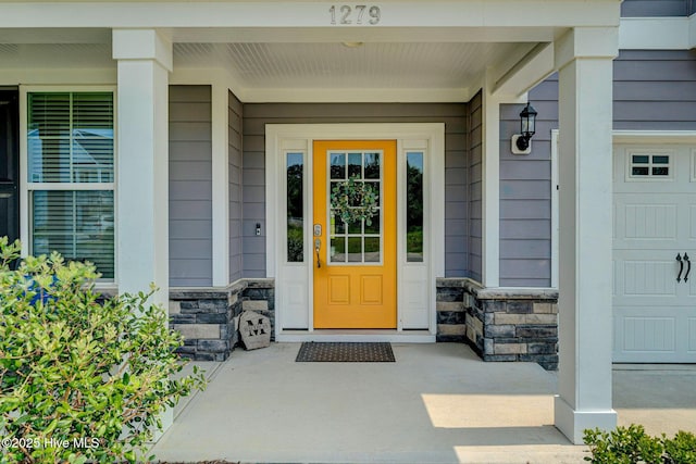 1279 Pandion Dr, Wilmington, NC 28411 - entrance to property with stone siding and a porch