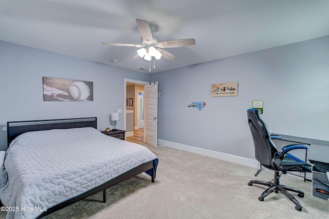1279 Pandion Dr, Wilmington, NC 28411 - bedroom featuring light colored carpet, baseboards, and ceiling fan