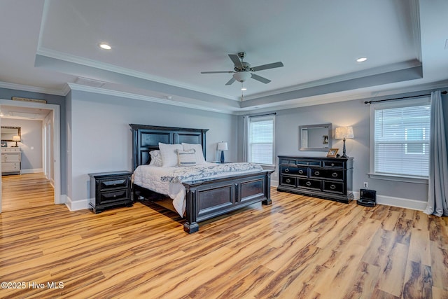1279 Pandion Dr, Wilmington, NC 28411 - bedroom featuring a raised ceiling, light wood finished floors, baseboards, recessed lighting, and ornamental molding