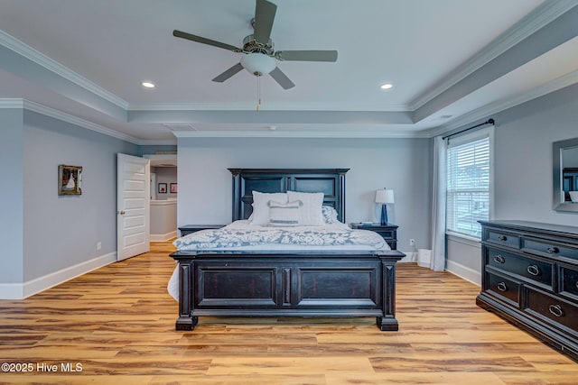 1279 Pandion Dr, Wilmington, NC 28411 - bedroom with light wood-style flooring, a raised ceiling, baseboards, crown molding, and recessed lighting