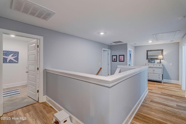1279 Pandion Dr, Wilmington, NC 28411 - hall with attic access, an upstairs landing, light wood-style floors, recessed lighting, and baseboards