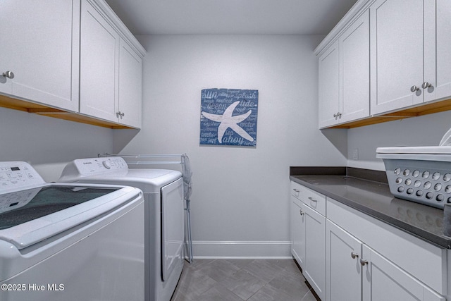 1279 Pandion Dr, Wilmington, NC 28411 - laundry area with separate washer and dryer, cabinet space, and baseboards