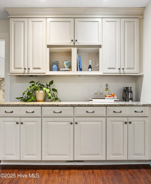 109 Dilworth Rd, Wilmington, NC 28411 - kitchen with light stone countertops, open shelves, dark wood finished floors, and white cabinets
