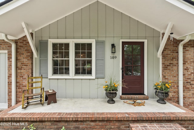 109 Dilworth Rd, Wilmington, NC 28411 - property entrance featuring board and batten siding and brick siding