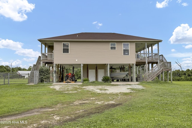 301 Intracoastal Ct, Sneads Ferry, NC 28460 - back of property with a carport, stairway, and driveway