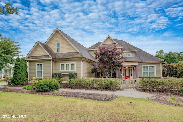 7406 Songbird Ct, Wilmington, NC 28411 - craftsman house with a gate and roof with shingles