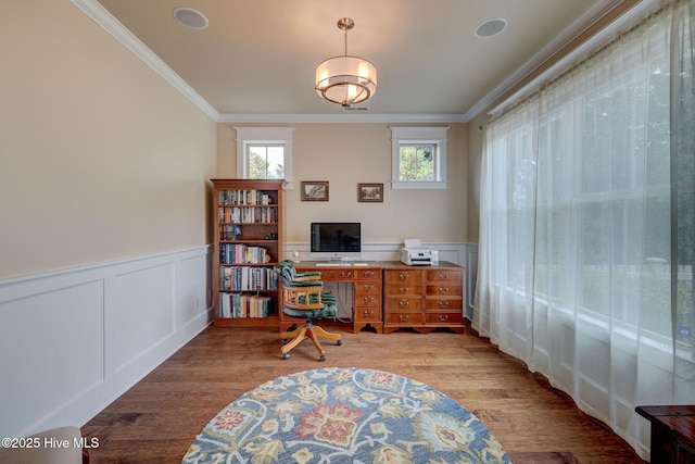 7406 Songbird Ct, Wilmington, NC 28411 - office area with ornamental molding, wood finished floors, wainscoting, and a decorative wall