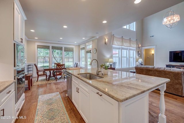 7406 Songbird Ct, Wilmington, NC 28411 - kitchen featuring a sink, open floor plan, stainless steel appliances, healthy amount of natural light, and recessed lighting