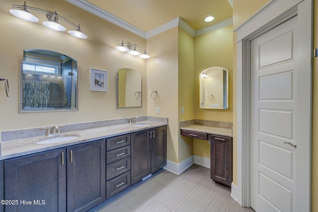 7406 Songbird Ct, Wilmington, NC 28411 - bathroom with ornamental molding, double vanity, baseboards, and tile patterned floors