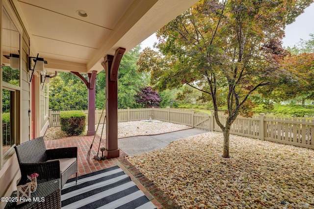7406 Songbird Ct, Wilmington, NC 28411 - fenced backyard featuring a patio