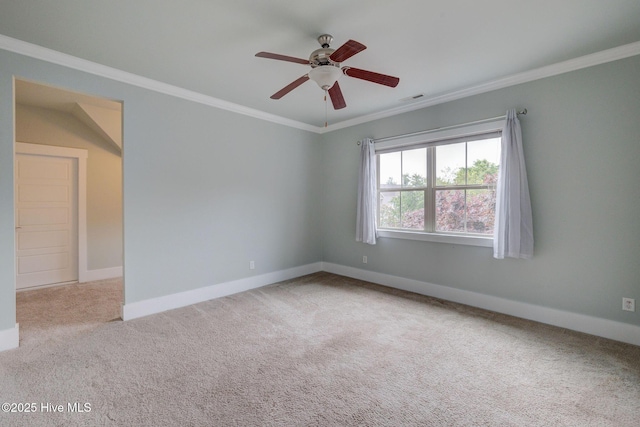 7406 Songbird Ct, Wilmington, NC 28411 - carpeted empty room with ornamental molding, a ceiling fan, and baseboards