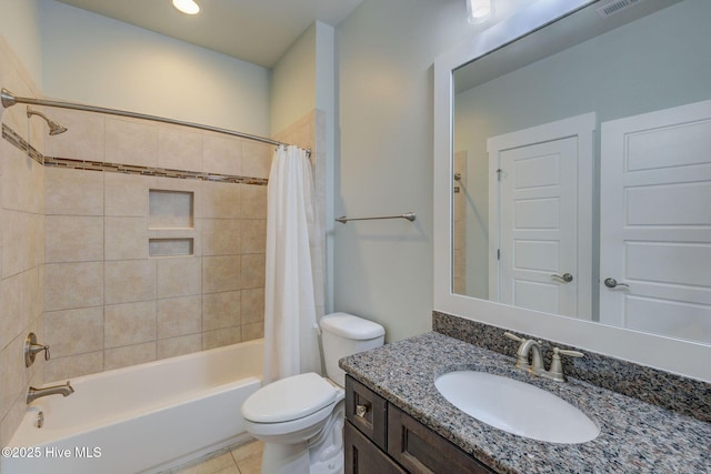 7406 Songbird Ct, Wilmington, NC 28411 - bathroom featuring vanity, shower / bath combo with shower curtain, toilet, tile patterned flooring, and recessed lighting