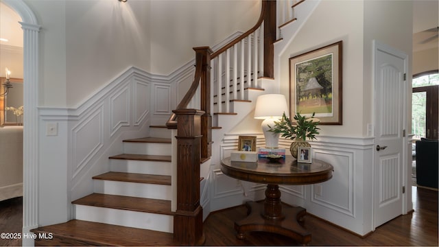 370 Lake Dornoch Dr, Pinehurst, NC 28374 - stairs featuring a decorative wall, a wainscoted wall, and wood finished floors