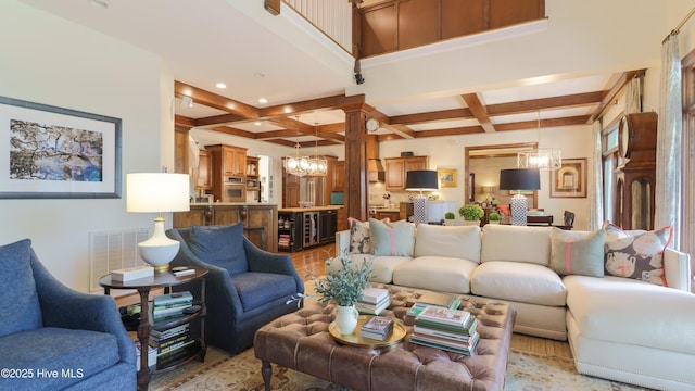 370 Lake Dornoch Dr, Pinehurst, NC 28374 - living area featuring coffered ceiling, a chandelier, beam ceiling, light wood-type flooring, and recessed lighting