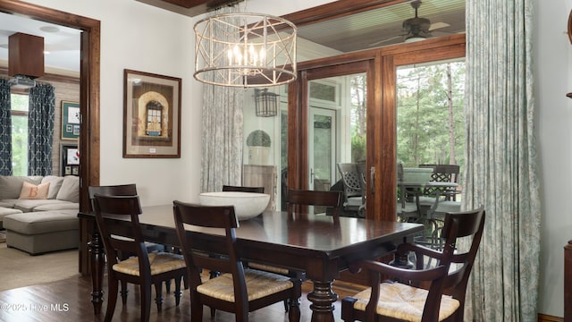 370 Lake Dornoch Dr, Pinehurst, NC 28374 - dining space featuring a chandelier and wood finished floors