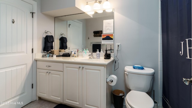 370 Lake Dornoch Dr, Pinehurst, NC 28374 - full bathroom with vanity, toilet, a shower with shower curtain, and tile patterned floors
