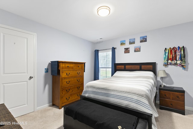 940 Pine Needles Rd, Southport, NC 28461 - carpeted bedroom with baseboards