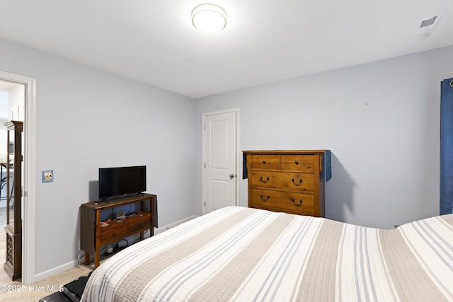 940 Pine Needles Rd, Southport, NC 28461 - bedroom featuring carpet and baseboards