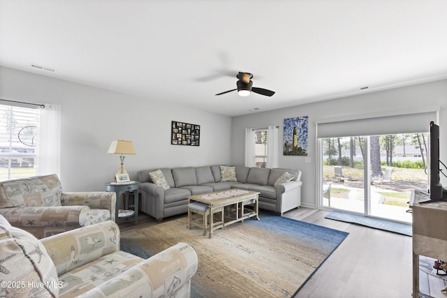 940 Pine Needles Rd, Southport, NC 28461 - living area with ceiling fan and wood finished floors