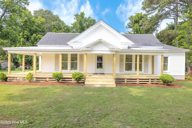 502 Sterlingworth St, Windsor, NC 27983 - view of front of house featuring roof with shingles, a porch, and a front yard