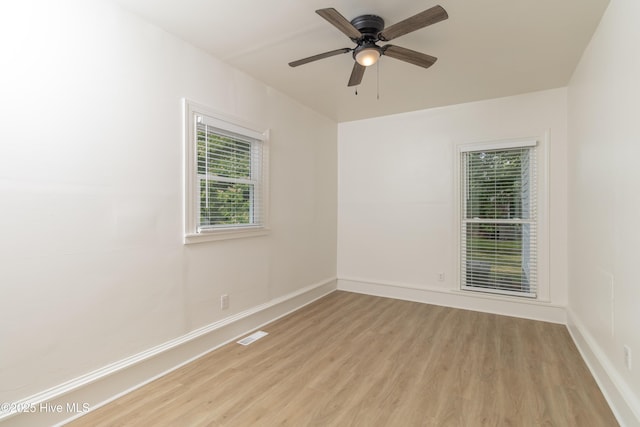 502 Sterlingworth St, Windsor, NC 27983 - unfurnished room with light wood finished floors, baseboards, and ceiling fan