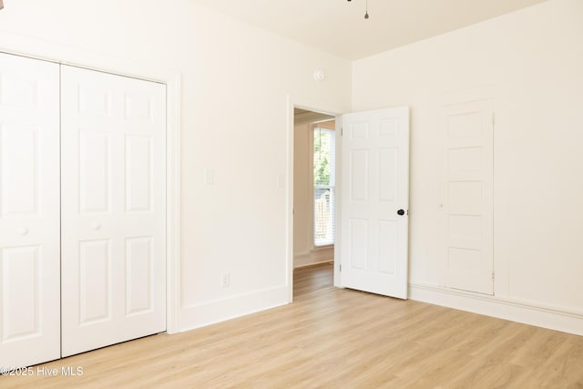 502 Sterlingworth St, Windsor, NC 27983 - unfurnished bedroom featuring light wood-style floors, a closet, and baseboards