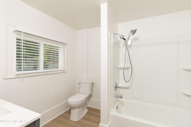 502 Sterlingworth St, Windsor, NC 27983 - full bath with wood finished floors, toilet,  shower combination, vanity, and baseboards