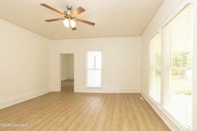 502 Sterlingworth St, Windsor, NC 27983 - unfurnished room featuring healthy amount of natural light, light wood-style floors, baseboards, and a ceiling fan