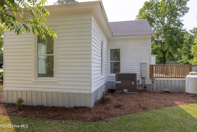 502 Sterlingworth St, Windsor, NC 27983 - view of side of home featuring central AC and a shingled roof