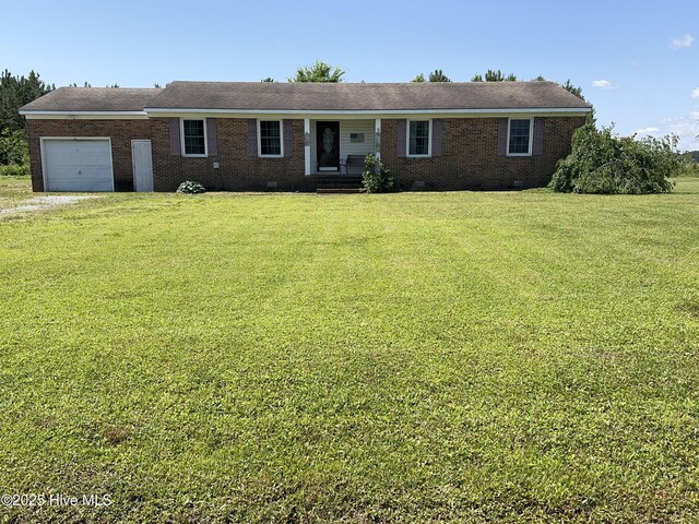 5 Keys Cross Rd, Hobbsville, NC 27946 - ranch-style home with a garage, a front yard, brick siding, and driveway