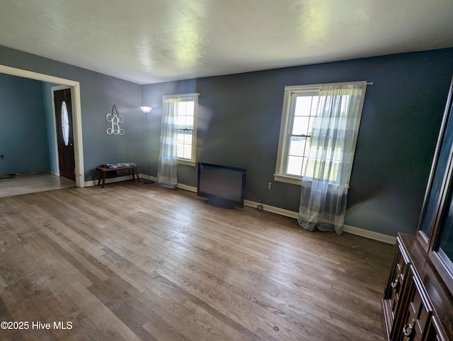 5 Keys Cross Rd, Hobbsville, NC 27946 - unfurnished living room featuring wood finished floors and baseboards