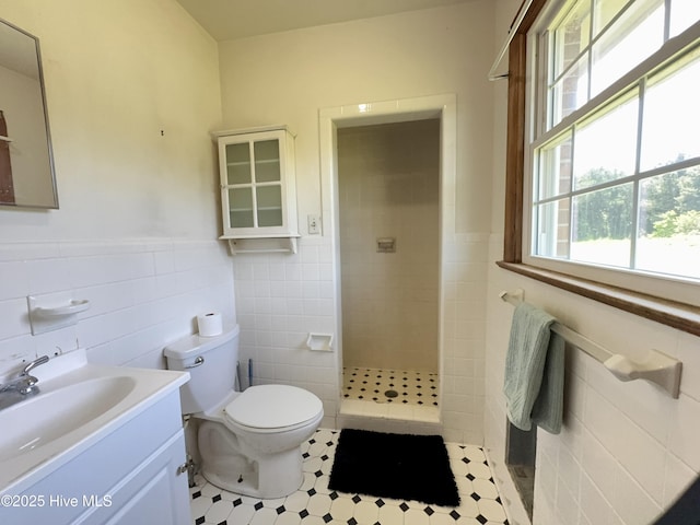 5 Keys Cross Rd, Hobbsville, NC 27946 - full bath featuring tile walls, a tile shower, toilet, wainscoting, and vanity
