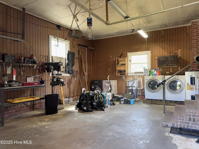5 Keys Cross Rd, Hobbsville, NC 27946 - garage with separate washer and dryer, water heater, a workshop area, wood walls, and a garage door opener